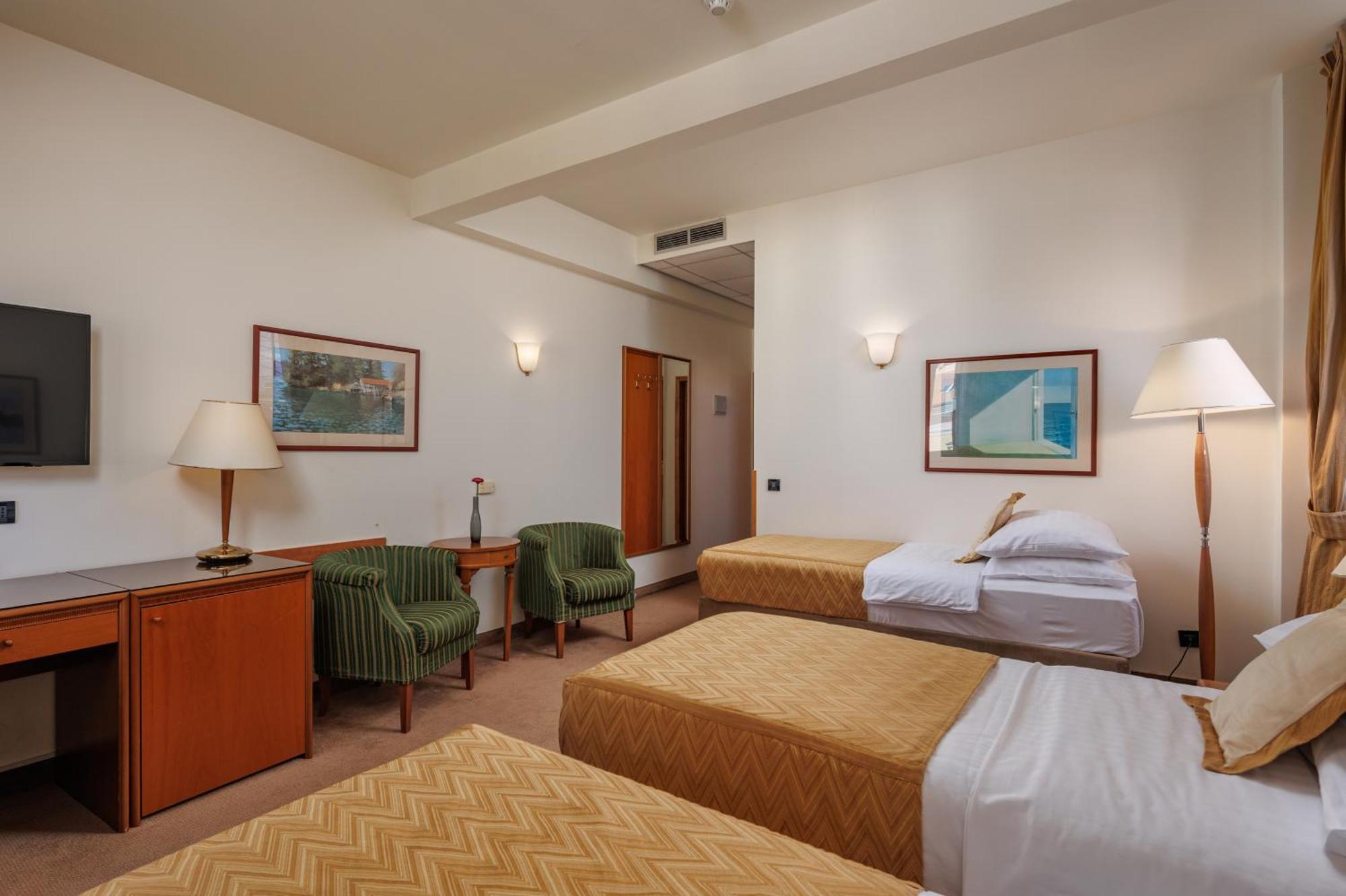 Camera Standard con letti singoli e letto extra